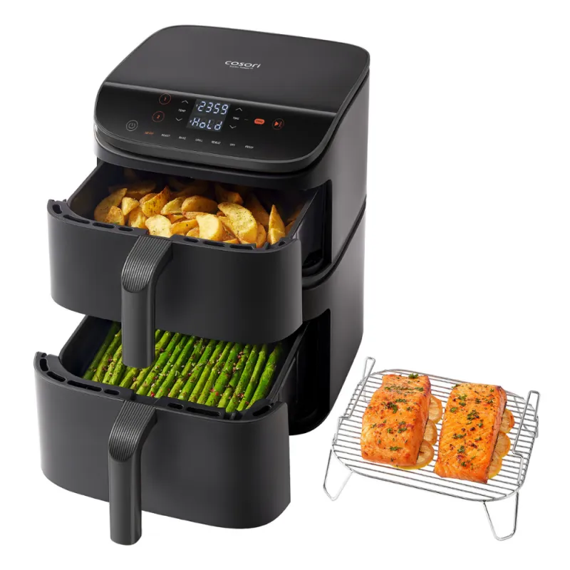 Geopende manden van de Cosori Turbo Tower, met ingrediënten Geopende manden van de Cosori Turbo Tower, met ingrediënten